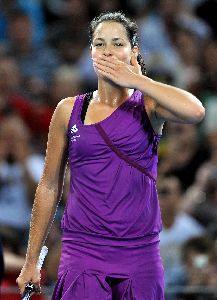 Ana Ivanovic happy as she scores points at the Brisbane International match yesterday