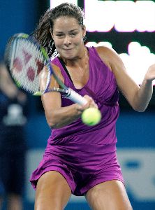 Ana Ivanovic playing against another tennis player at the Brisbane International match