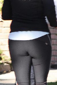 Reese Witherspoon wearing tight pants yesterday as she walked through the streets for her morning training