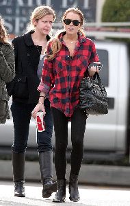 Lindsay Lohan : walking back to her SUV with a group of friends in California 5th January 2009