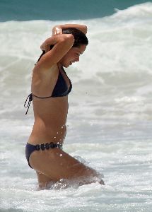 Ana Ivanovic : spotted swimming at the beach in Australia where she is vacationing wearing a black bikini