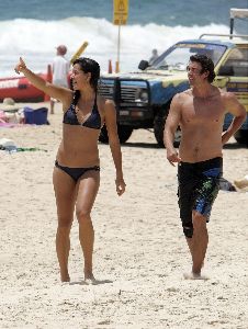 Ana Ivanovic : walking on the beach in Australia wearing a black bikini