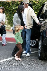 Courtney Cox : with lil daughter Coco about to get into their car in Beverly Hills on Jan5, 2009