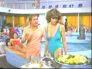 Markie Post in a blue swimsuit