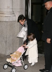 Suri Cruise together with her bunny-baby