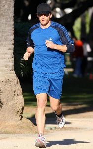 Jake Gyllenhaal runs for his work out routine