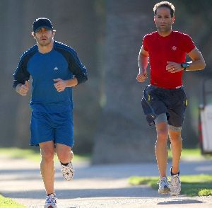 Jake Gyllenhaal running with his his personal trainer on Wednesday in Santa Monica, California 14th of January 2009