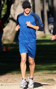 Jake Gyllenhaal running with his his personal trainer on Wednesday in Santa Monica, California 14th of January 2009