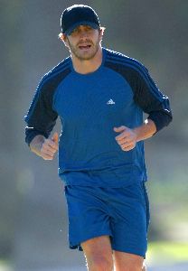 Jake Gyllenhaal running with his his personal trainer on Wednesday in Santa Monica, California 14th of January 2009