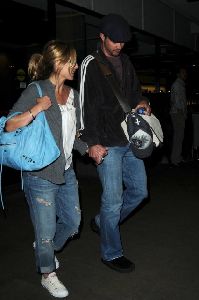 Sarah Michelle Gellar candids at LAX with Freddie Prinze Jr on Jan 11th, 2009