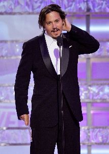 Johnny Depp : on stage presenting an award at the 66th Annual Golden Globe Awards in Beverly Hills, January 11 2009