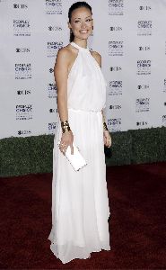 Olivia Wilde wears a white dress for the 35th Annual Peoples Choice Awards