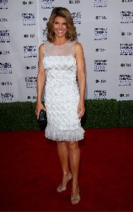 Lori Loughlin arrives at the 35th annual Peoples Choice awards