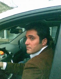 Alpay Kemal Atalan driving his car