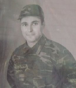 Alpay Kemal Atalan in military outfit