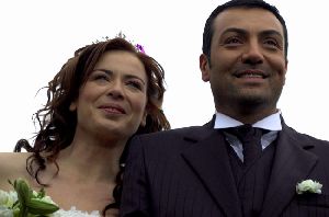 Saruhan Hunel and Yesim Buber as Esmer and Ezel on their wedding day from Kaybolan yillar