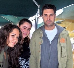 Burak Hakki picture taken with two fan girls