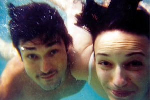 Burak Hakki swimming with his wife Sema Simsek