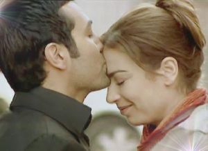 Yesim Buber and Saruhan Hunel as Esmer and Ezel in the turkish tv series Kaybolan yillar