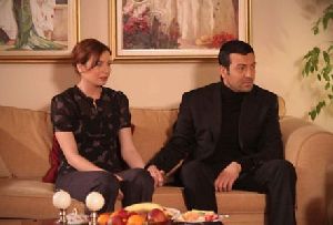 Yesim Buber and Saruhan Hunel as Esmer and Ezel in the turkish tv series Kaybolan yillar