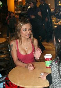 tila tequila : spotted out at Strabucks wearing green weird eye lense color