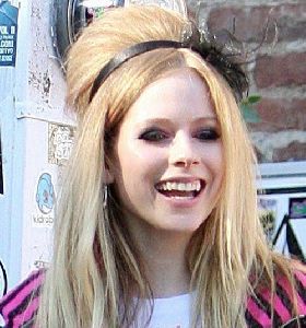 Avril Lavigne standing outside the Viper Room nightclub