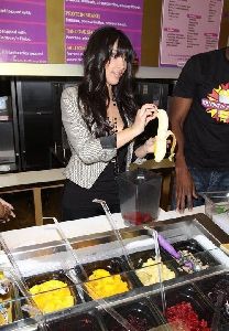 Kim Kardashian : about to eat a banana at Millions of Milkshakes in West Hollywood. Los Angeles, California on the 16th of January 2009