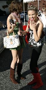 AnnaLynne McCord : with her sister Rachel outside the 2009 Babes on the Bull charity event at the Saddle Ranch Chop House in West Hollywood, California on Sunday, January the 25th, 2009