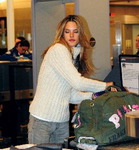 Alessandra Ambrosio : carrying her bags at LAX airport on Wednesday, January 28th 2009