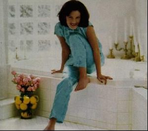 lana wood in a light blue pijama