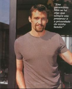 Actor hugh jackman wearing a brown t-shirt