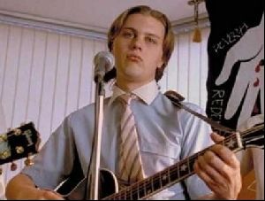 Actor michael pitt playing the guitar