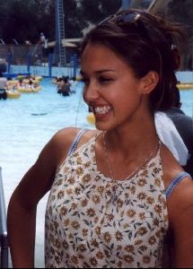 Actress jessica alba in a summer floral dress at the pool