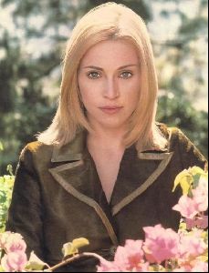 music madonna picture wearing a brown and beige chest jacket