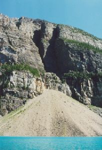 Cities Canada : A rockslide from a cliff above Lake Moraine.