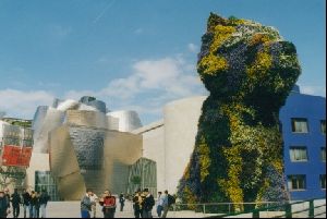 Cities Europe Spain : The Pup, a flower sculpture, and the new Guggenheim Museum in Bilbao.