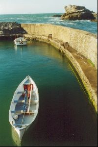 Cities Europe France : The calm Port des Pêcheurs  port of the fishermen  and the mighty Atlantic b