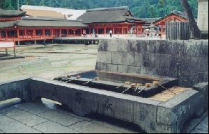 Cities Asia Japan : The entrance to Itsukushima Shrine, where you rinse your mouth and hands before