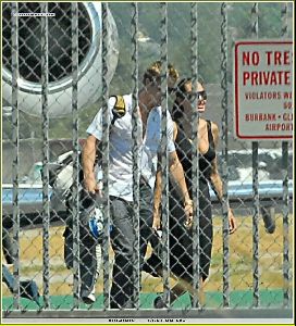 Angelina Jolie and Brad Pitt picture as they are on the runway of Burbank airport on August 26th 2006