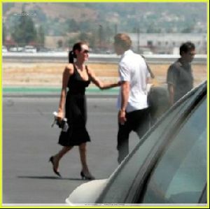 Angelina Jolie and Brad Pitt picture as they are on the runway of Burbank airport on August 26th 2006