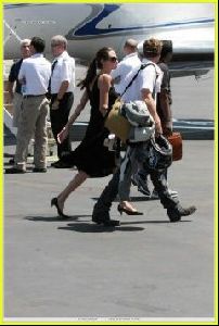 Angelina Jolie and Brad Pitt picture as they are on the runway of Burbank airport on August 26th 2006