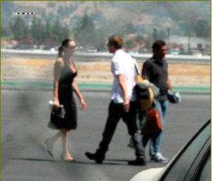 Angelina Jolie and Brad Pitt picture as they are on the runway of Burbank airport on August 26th 2006