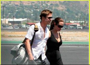 Angelina Jolie and Brad Pitt picture as they are on the runway of Burbank airport on August 26th 2006