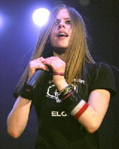 Avril Lavigne singing on stage