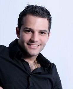 Hani Mitwasi in a black shirt