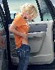 Pictures of Jessica simpson wearing an orange t-shirt checking her tummy