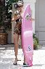 Sexy Celebrity Paris Hilton after going out of jail getting redy to surf the sea