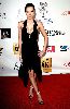 Model Adrianne Curry black dress pictures