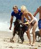 Actress Heather Locklear playing on the beach pictures