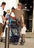 Sexy Angelina Jolie with her husband Brad Pitt and their children pictures en masse exits Chicago’s